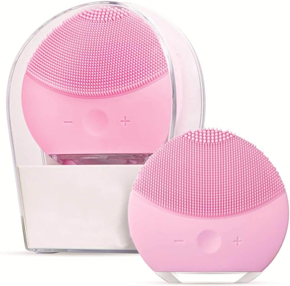 Axiva – Silikon Ansiktsrengöringsborste in pink color, showing facial cleansing brush and its charging base.
